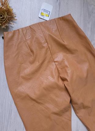 Брюки из искусственной кожи.новые. 8