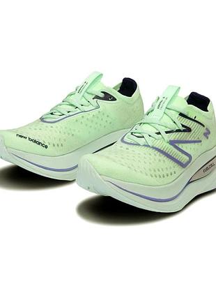 Бігові кросівки new balance fuelcell supercomp trainer розмір 40.5