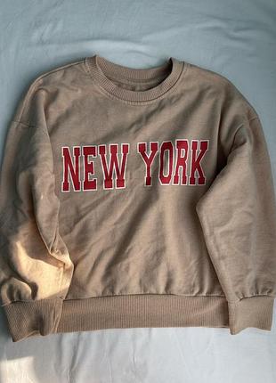 Бежевий світшот crewneck з написом new york для дівчинки / хлопчика 122 см sinsay