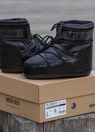 Moon boot  black glow 9