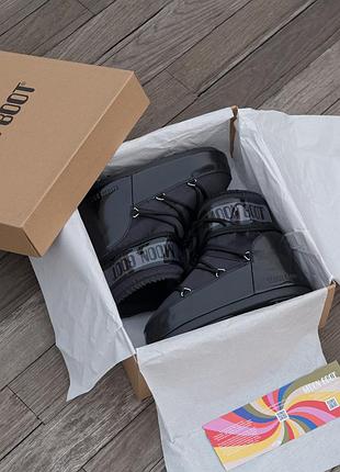 Moon boot  black glow 10