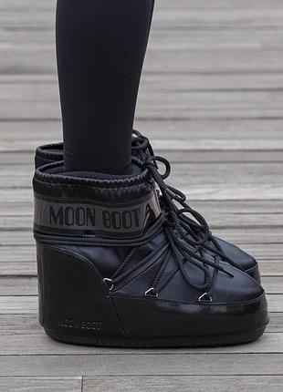 Moon boot  black glow 4