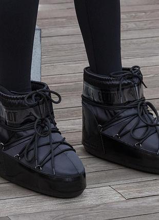 Moon boot  black glow 6