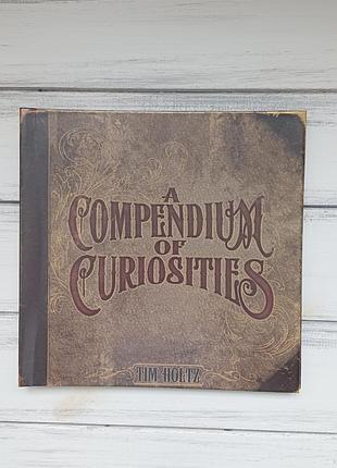 Книга "a compendium of curiosities"  дизайнера та майстра скрапбукінгу тіма хольца (tim holtz).