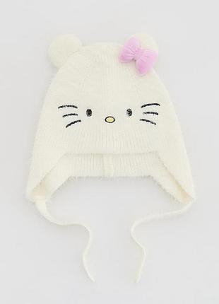 Красива шапочка для дівчинки на завʼязках hello kitty бренду reserved