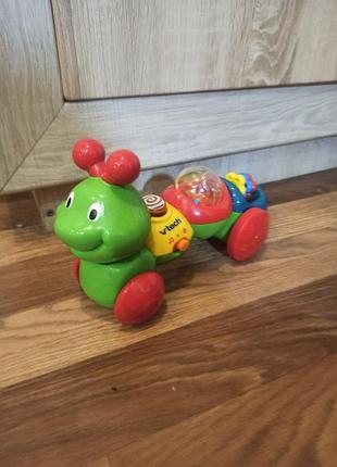 Інтерактивна розвиваюча іграшка гусениця vtech wheel and wiggle caterpillar (музична іграшка-каталка для малюків).