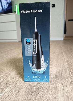 Портативный ирригатор для ротовой полости water flosser.