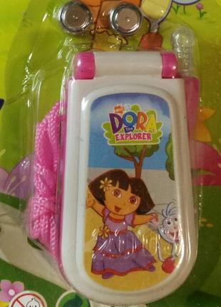 Іграшка. музичний телефон разом з батарейками