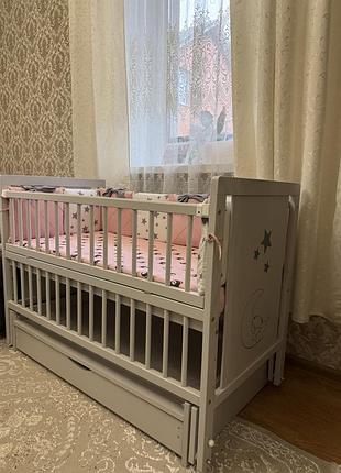 Дитяче ліжко з маятником