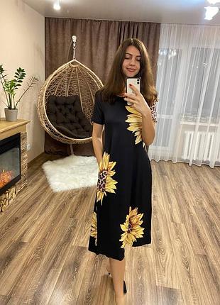 Платье летнее с подсолнечниками черно желтое сарафан

платье новое
оденьте на параметры: 86/62/93, рост 174 см