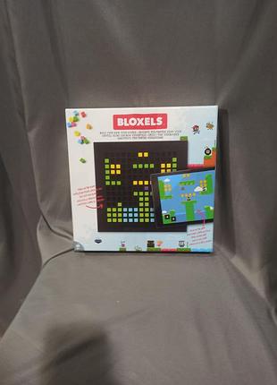 Настольная игра набор bloxels (build your own video game creation kit) от бренда mattel.
конструктор для создания собственных 2d видеоигр