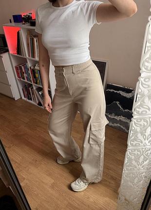 Бежеві штани карго fashionista