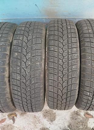 Зимние шины диски колеса маркировкой 155/70 r13 75q. бренда riken, сербия