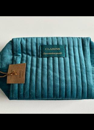 Косметичка clarins 20 * 12 * 5 см нова