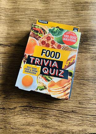 Настільна гра-вікторина "food trivia quiz" від відомого бренда paladone, яка містить 100 цікавих запитань для перевірки знань про їжу та напої