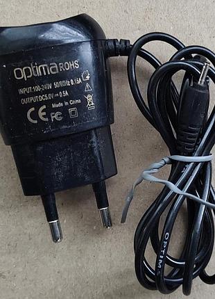 Зарядное устройство optima 5v 0.5a (тонкий круглый штекер)