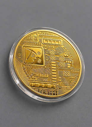 Сувенірна монета біткоїн (bitcoin). золотистого кольору у капсулі. на  подарунок