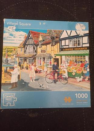 Пазл «village square» (площадь села) на 1000 элементов из серии corner piece puzzles, художник тревора метчелла (trevor mitchell)