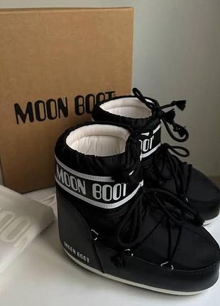Жіночі чоботи мунбути moom boot чорнй колір