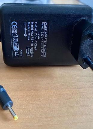 Блок питания / зарядный / адаптер постоянного тока 7v 300ma/ва фирма europlug / трансформаторный / длина кабеля 215см / был привезен из германии !