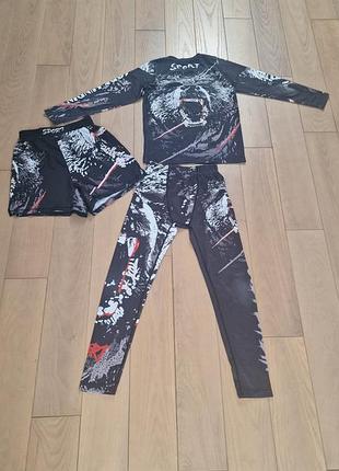 Спортивний комплект для хлопчиків cody lundin grizzly компресійний 3в1 (рашгард, шорти та легінси) чорний з принтом, зріст 130–150 см, вік 8–12 років