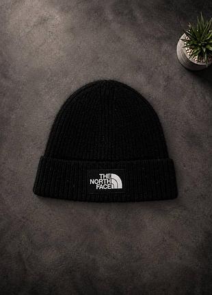 Стильная черная шапка бини бренда the north face