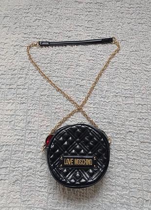 Love moschino кругла сумка ремонт