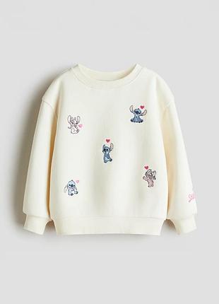 Світшот для дівчинки h&m молочний з принтом disney stitch