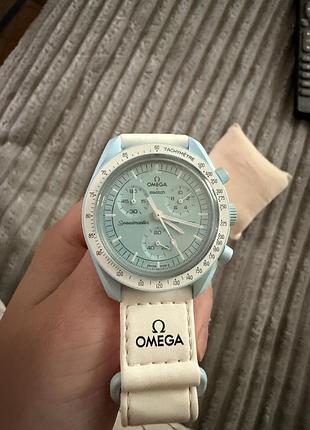 Годинники унісекс omega x swatch bioceramic moonswatch mission to uranus з білим ремінцем