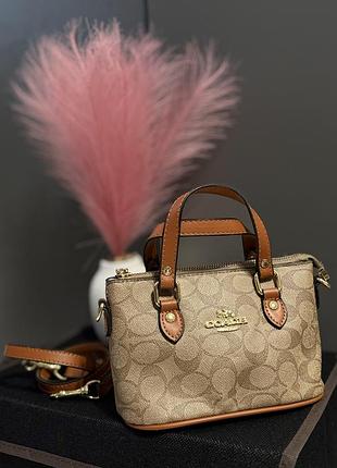 Сумка жіноча coach коричнева маленька з монограмою