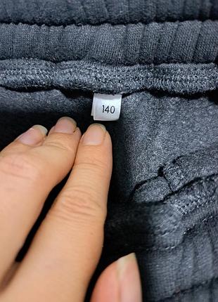 Теплые брюки на 140см 2