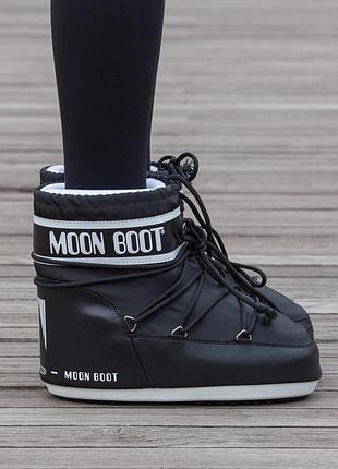 Жіночі зимові дутики moon boot чорні утеплені з термовкладишем на шнурівці (b)