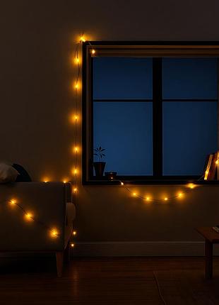 Новорічна кімнатна гірлянда нитка 6 м 50 led чорний провід жовте свічення