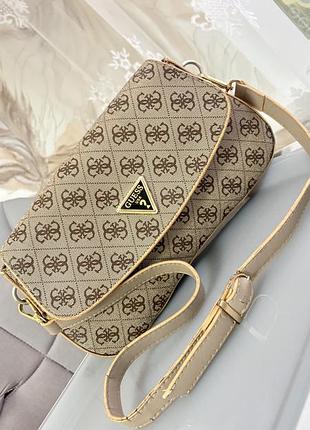 Сумка жіноча guess багет бежево-коричнева з геометричним принтом