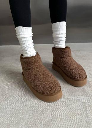 Ugg ultra mini platform teddy ginger
☺️матеріал:замша, хутро, водовідштовхувальна пропитка 💦
☺️виробник: china 🇨🇳 
☺️розміри: 37-41
 ціна: 2999 грн 5