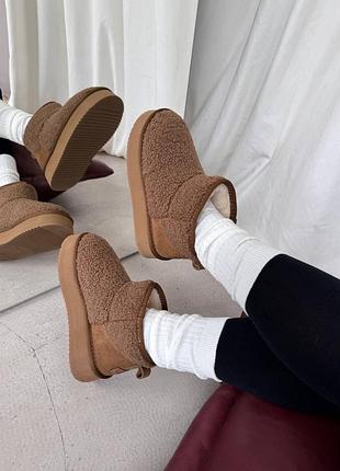Ugg ultra mini platform teddy ginger
☺️матеріал:замша, хутро, водовідштовхувальна пропитка 💦
☺️виробник: china 🇨🇳 
☺️розміри: 37-41
 ціна: 2999 грн 7