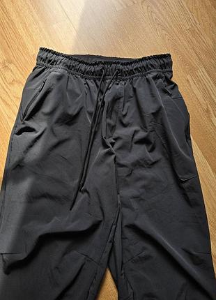 Nike dri-fit unlimited tapered leg versatile training pants black fb7548-010 спортивні брюки 6