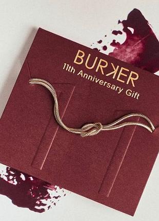 Браслет burker в золотистом цвете.