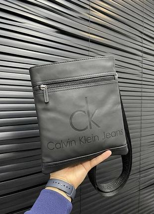 Барсетка calvin klein чорна пласка