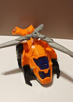 Помаранчевий вертоліт-трансформер із набору vtech switch & go 3-in-1 rescue rex