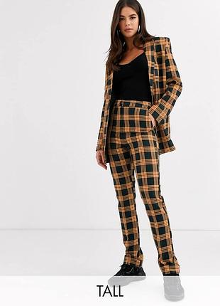 Брюки в клетку collusion (asos) оранжево-черные petite uk 10