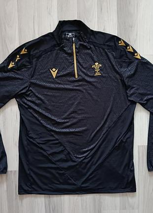 Черная тренировочная спортивная кофта сборной уельсы из регби (welsh rugby union, wru) от бренда macron из коллекции 2024/25 года в черно-золотом цвет