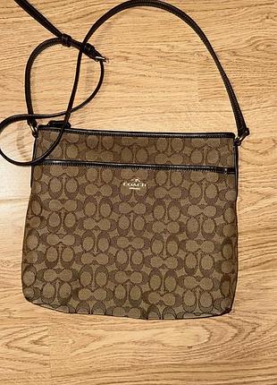 Сумка жіноча coach file bag in signature canvas f58285 коричнева