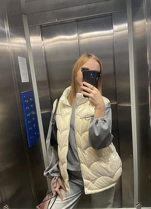 Жіноча перламутрова жилетка 2