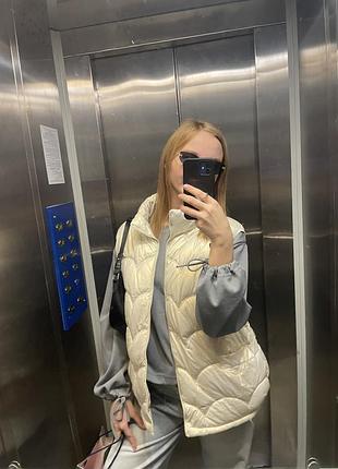Жіноча перламутрова жилетка