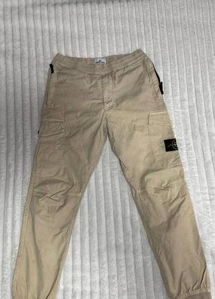 Оригінальні брюки stone island sand type re tela cotton cargo trousers