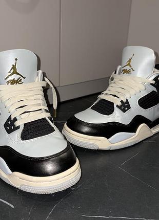 Кросівки jordan 4 retro platinum gold gs голубо-чорні