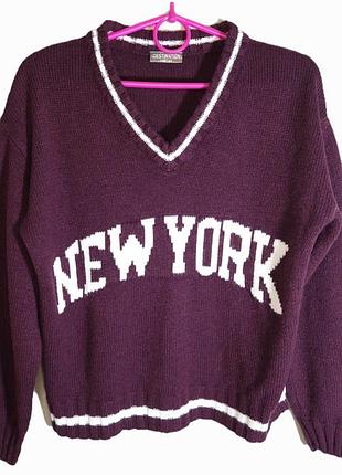 Пуловер destination з написом new york