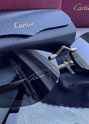 Сонцезахисні окуляри безправні чорні із золотою оправою (версія cartier)