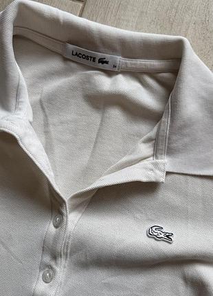 Поло жіноче lacoste біле розмір 34 (xs)